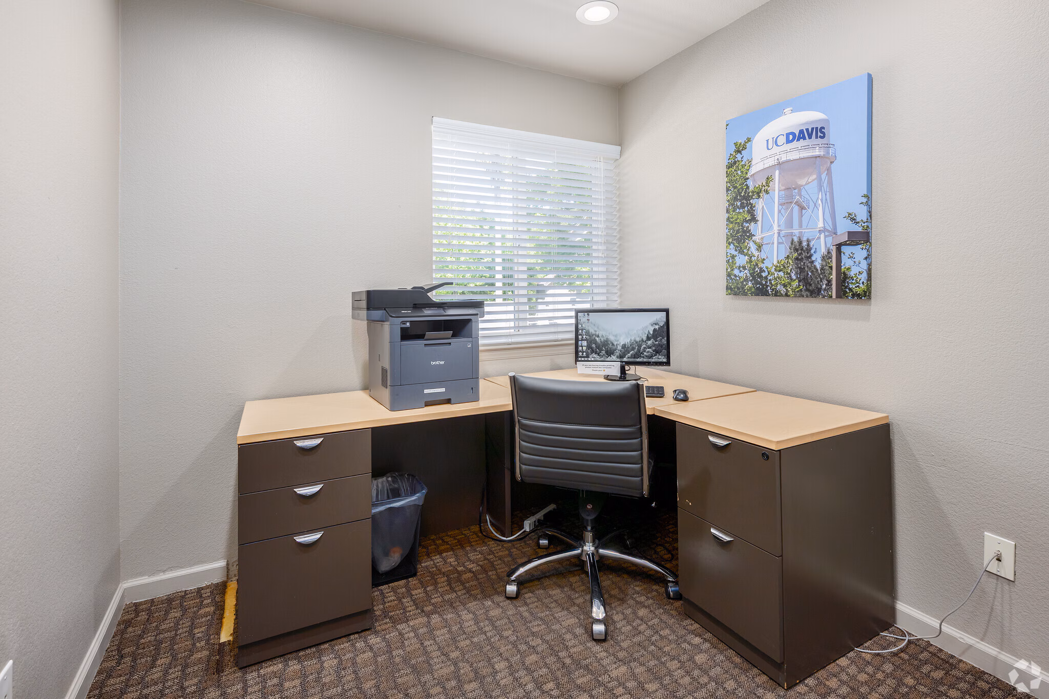 Computer room with desktop workstations and seating for residents