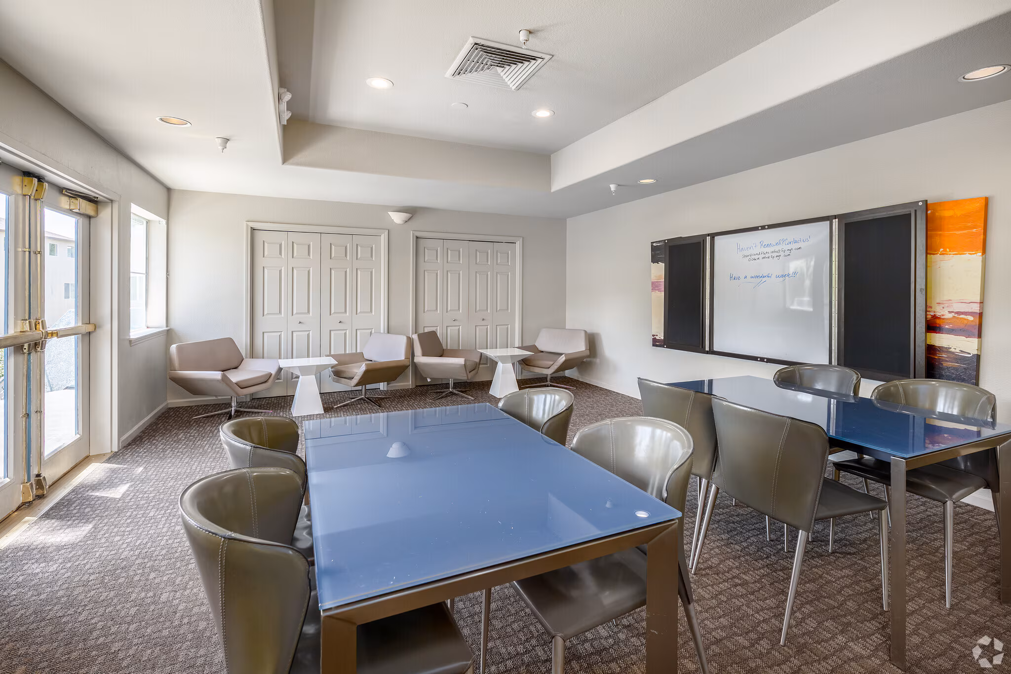 Bright study lounge with tables and seating at Sharps & Flats